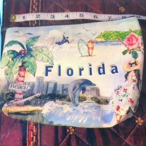 MOVING SALE NO HAGGLING OH FASHION 8.5”x 6” SMALL ZIP TOP FLORIDA COSMETIC BAG.